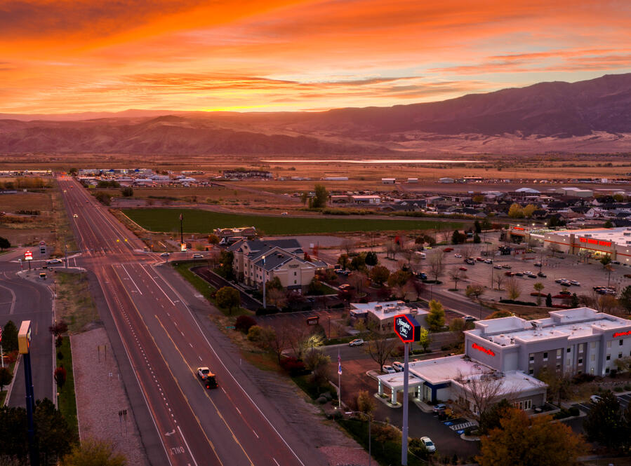 Farm in the country surounded by fields